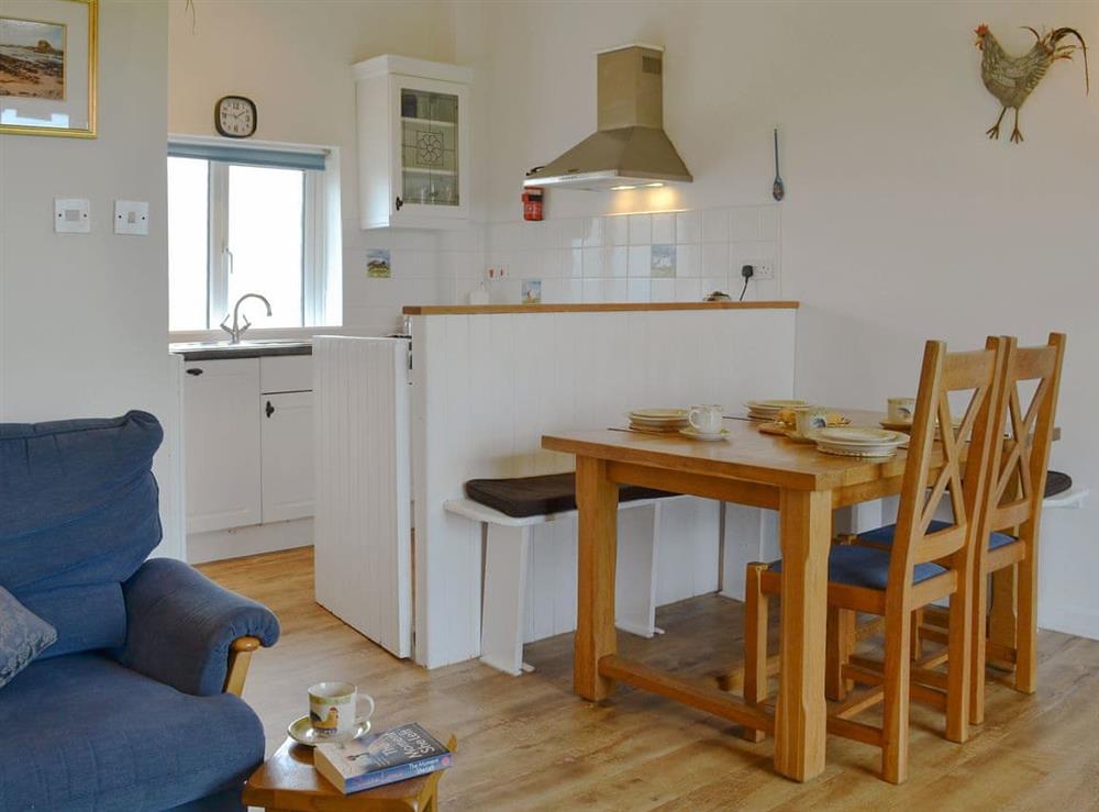 Kitchen and dining area at Barn Cottage, 