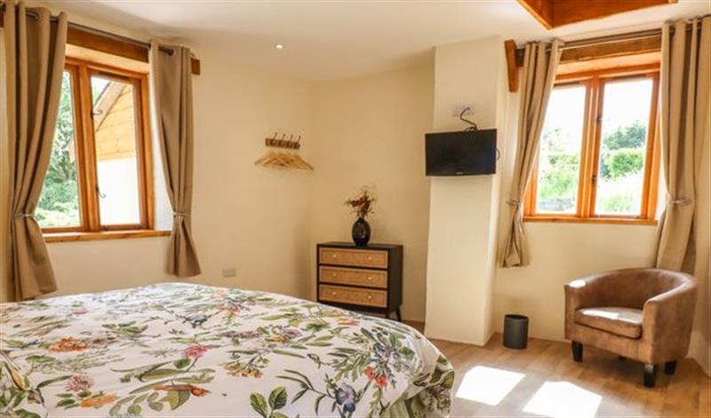 This is a bedroom (photo 2) at Quoit X Barn, Stoodleigh near Bampton