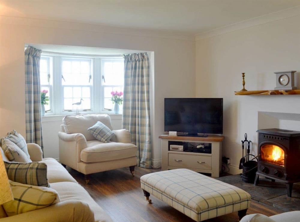 Warm, cosy living room at Raglan Cottage in Ardentinny, near Dunoon, Argyll