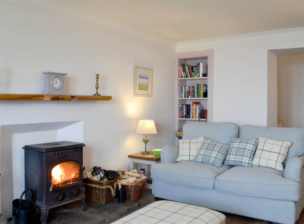 Warm, inviting living room at Raglan Cottage in Ardentinny, near Dunoon, Argyll