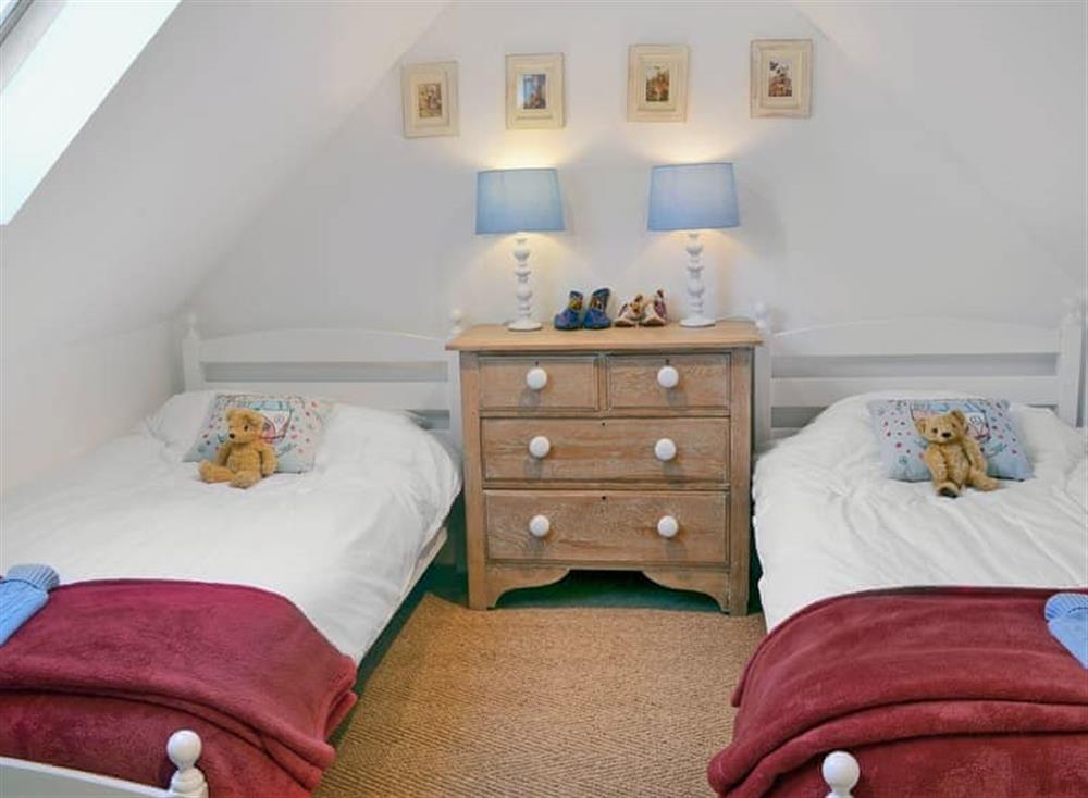 Twin bedroom at Ragwood Cottage in 