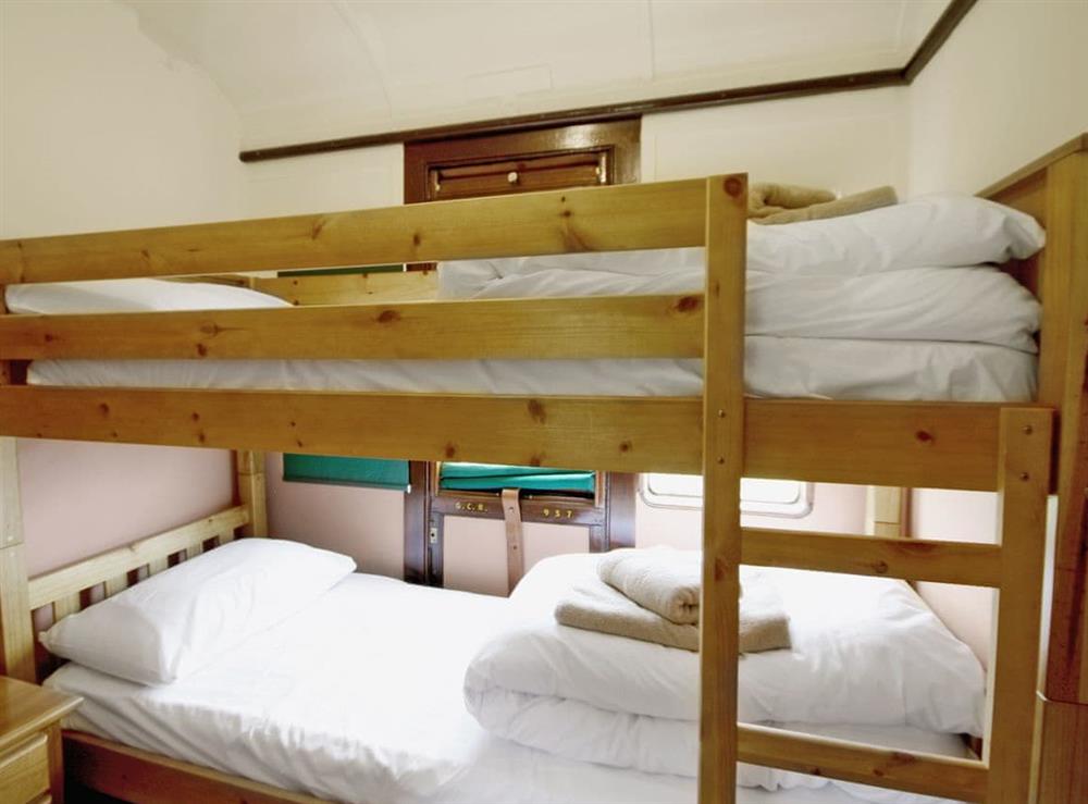 Bunk bedroom at Railway Carriage Two in Brockford, near Stowmarket, Suffolk