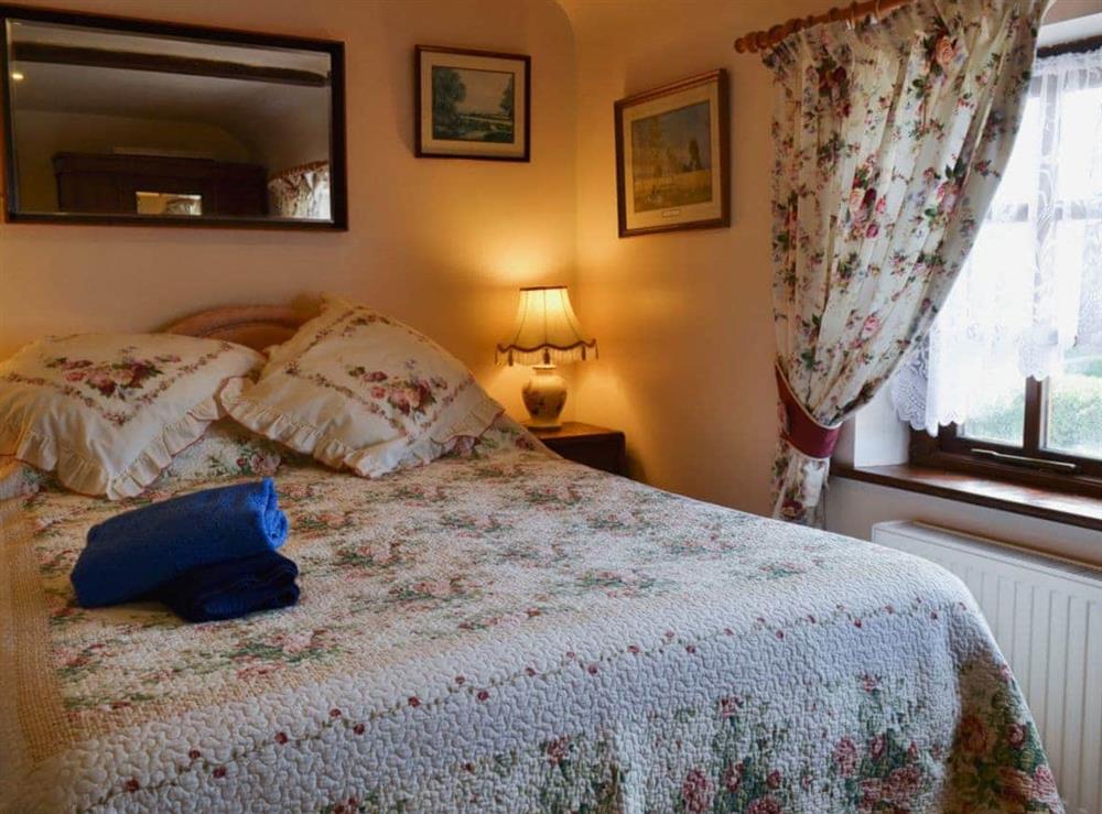 Double bedroom at Railway Cottage in East Burton, near Wareham, Dorset