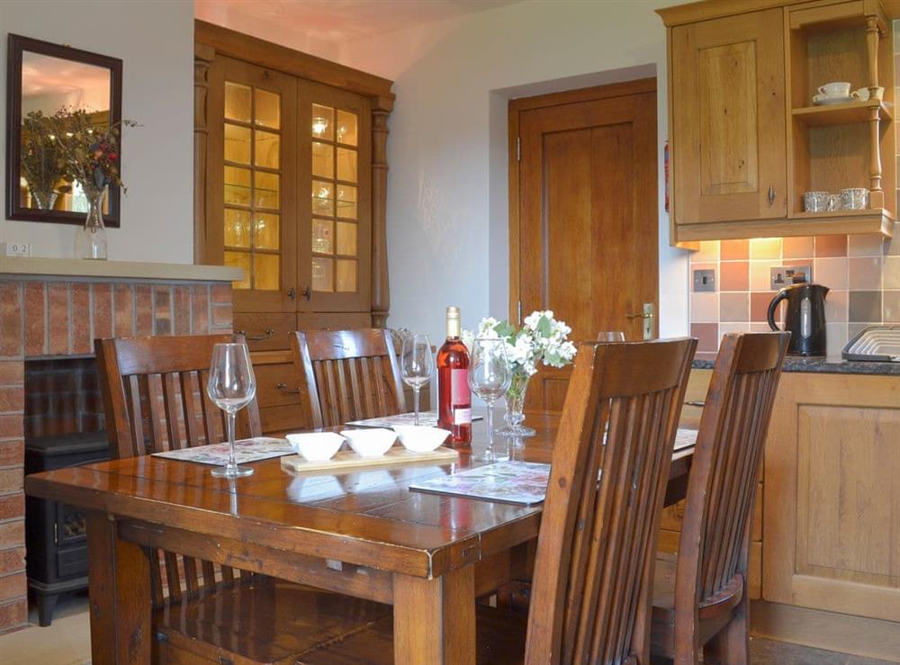 Stylish dining area within kitchen at Railway Cottage in Longcliffe, near Ashbourne, Derbyshire