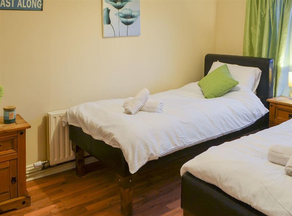 Comfortable en-suite twin bedroom at Dove Cottage, 