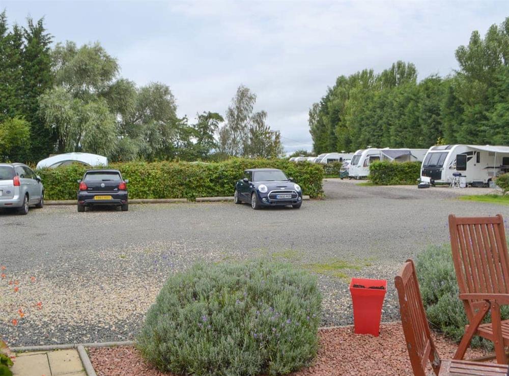 Parking area with small camp site to rear at Rose Cottage, 