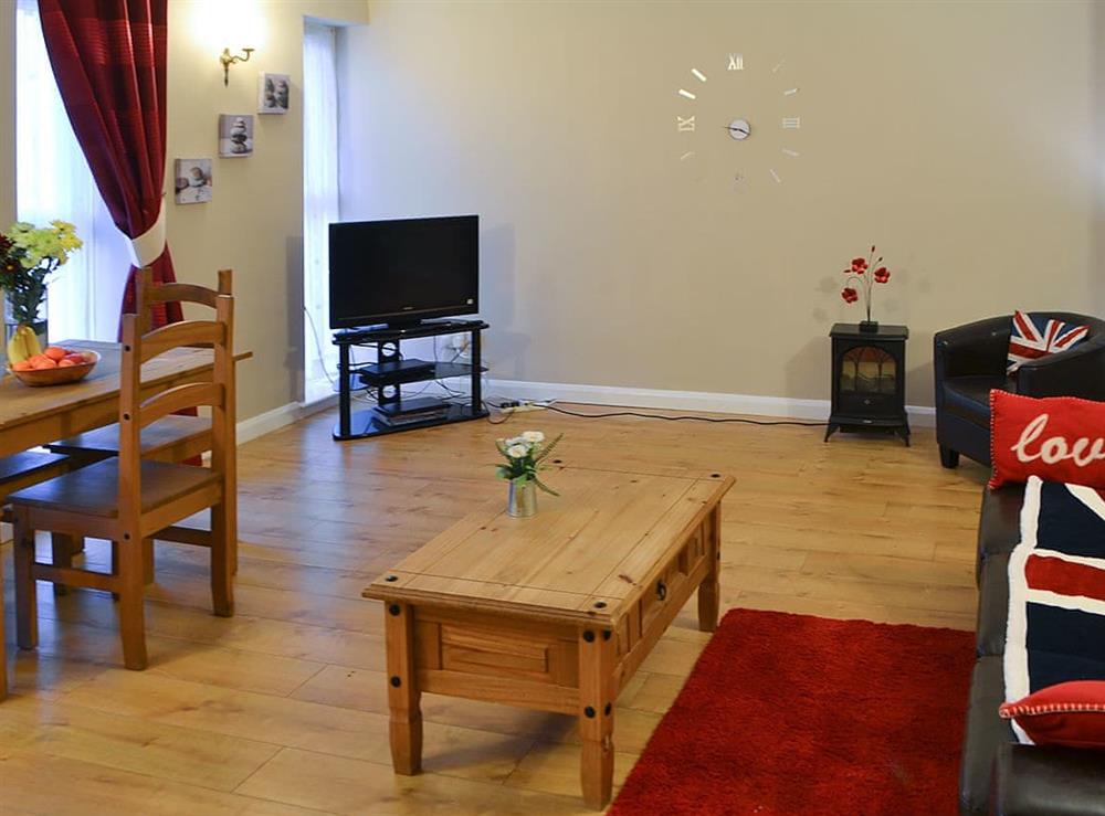 Welcoming open-plan living space at Rose Cottage, 