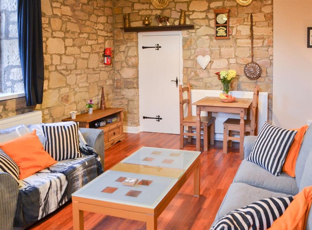 Characterful living and dining room at Stable Cottage, 
