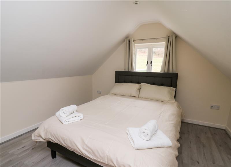 A bedroom in Railway Station Cottage at Railway Station Cottage, New Radnor near Kington