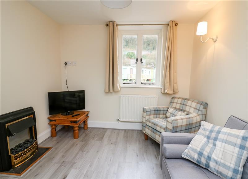 Relax in the living area at Railway Station Cottage, New Radnor near Kington
