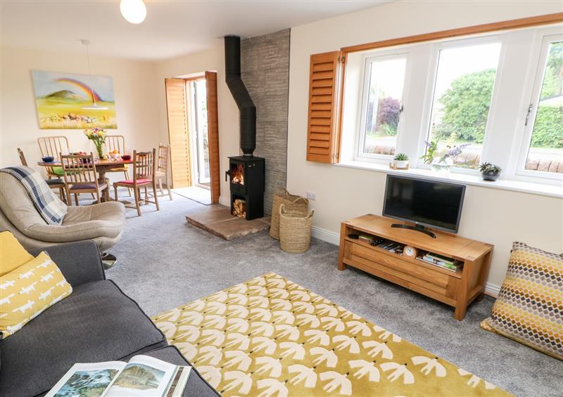 Relax in the living area at Rainbow Cottage, Bolton near Appleby-In-Westmorland