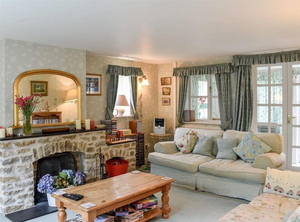 Living room at Rainbow Cottage in Bridport, Dorset