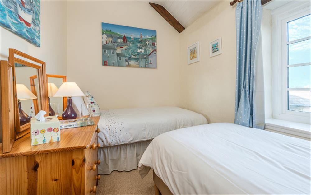 The second bedroom has 3ft twin beds. at Rainbow Cottage in Porthallow