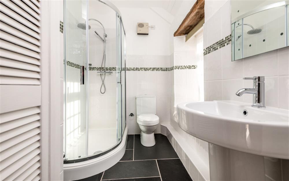 The modern shower room has a nice roomy shower cubicle. at Rainbow End in Porthallow