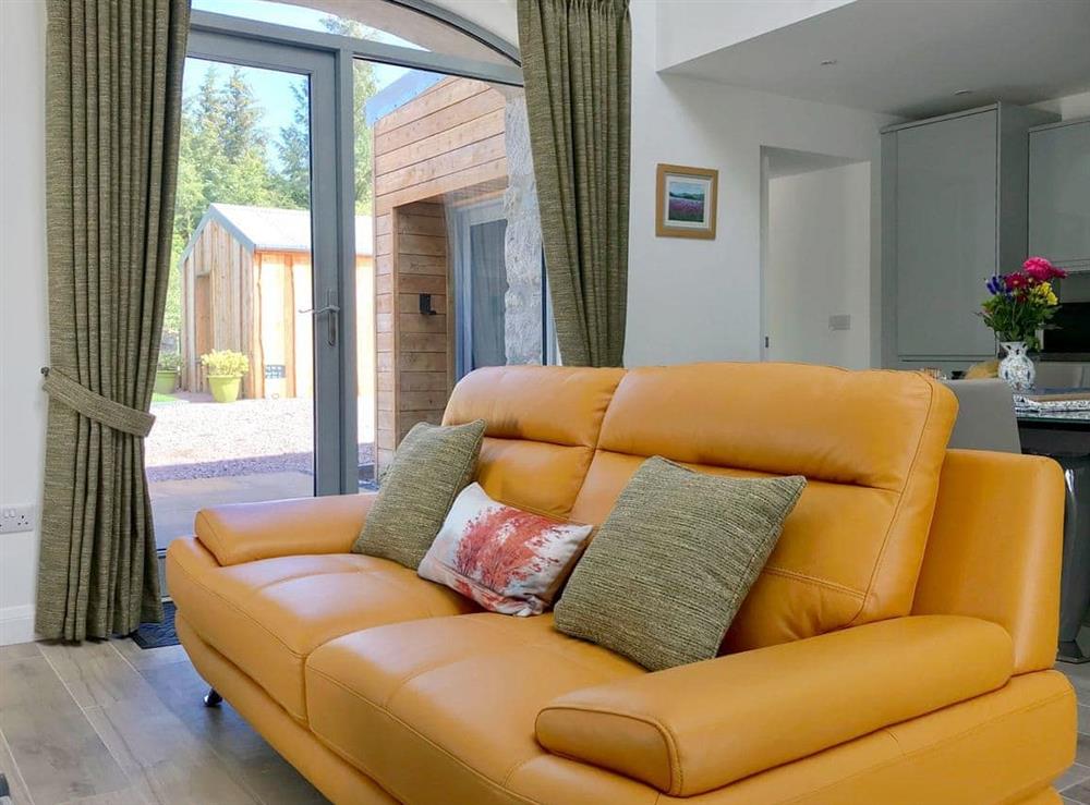 Comfortable open plan living space at Ramerish Retreat in Laurieston, near Gatehouse of Fleet, Kirkcudbrightshire