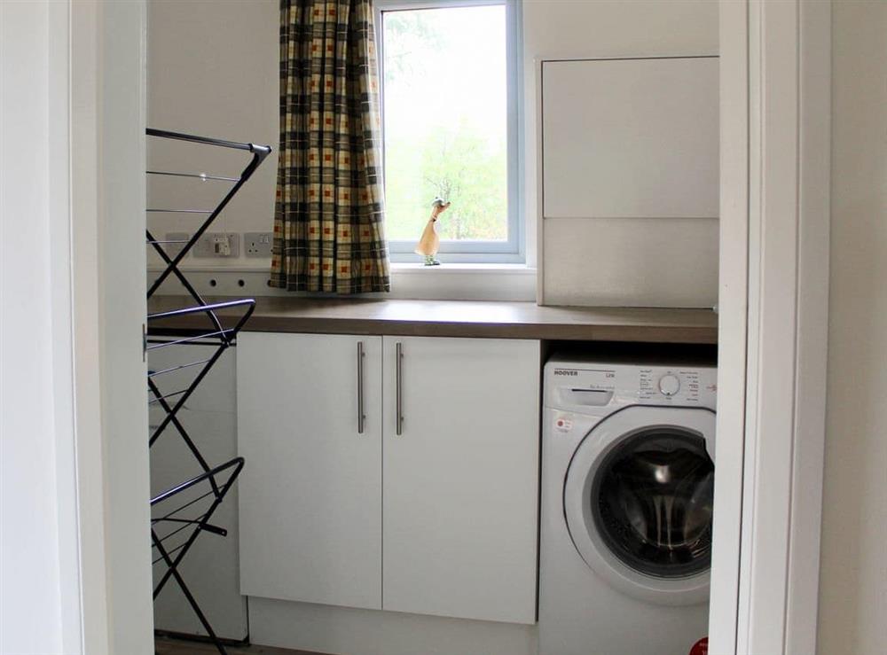 Utility room with laundry facilities at Ramerish Retreat in Laurieston, near Gatehouse of Fleet, Kirkcudbrightshire
