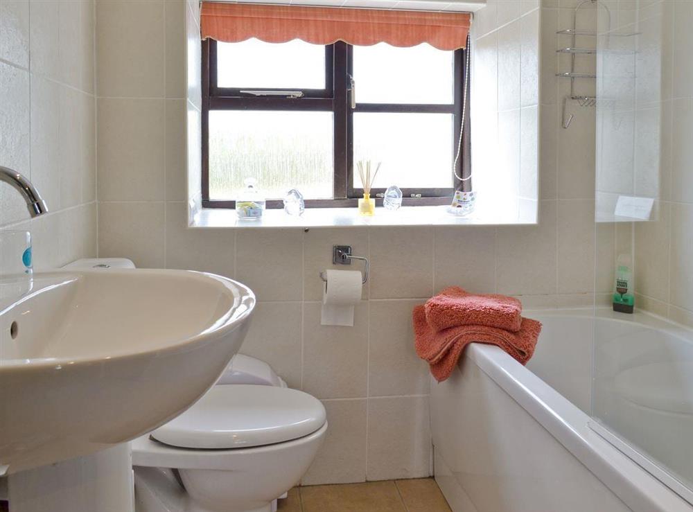 Bathroom with shower over bath at Ramscliff Cottage in Nr Wells, Somerset., Great Britain