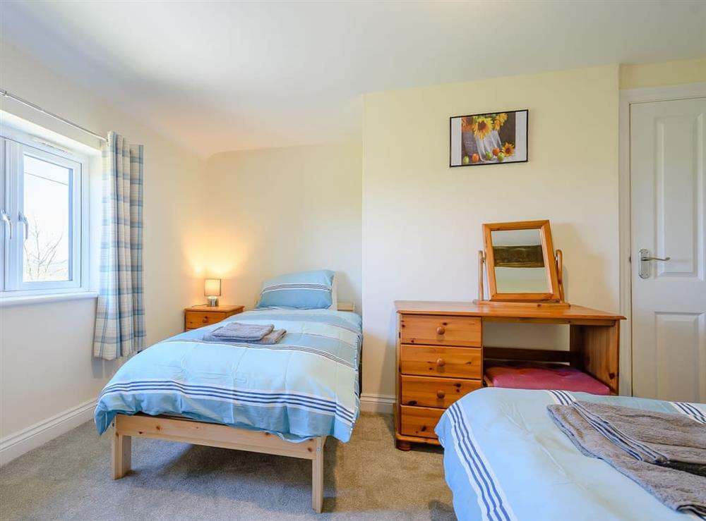 Twin bedroom at Rathlin Cottage in Cambridge, near Lower Cam, Gloucestershire