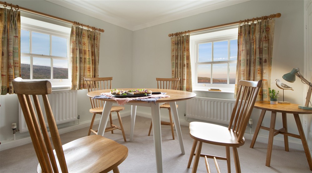 The dining area at Ravenscar Chapel Cottage in Scarborough, North Yorkshire