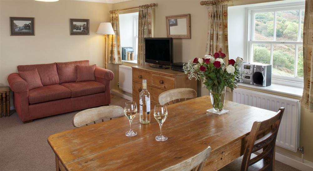 The sitting and dining room at Ravenscar Chapel Cottage in Scarborough, North Yorkshire