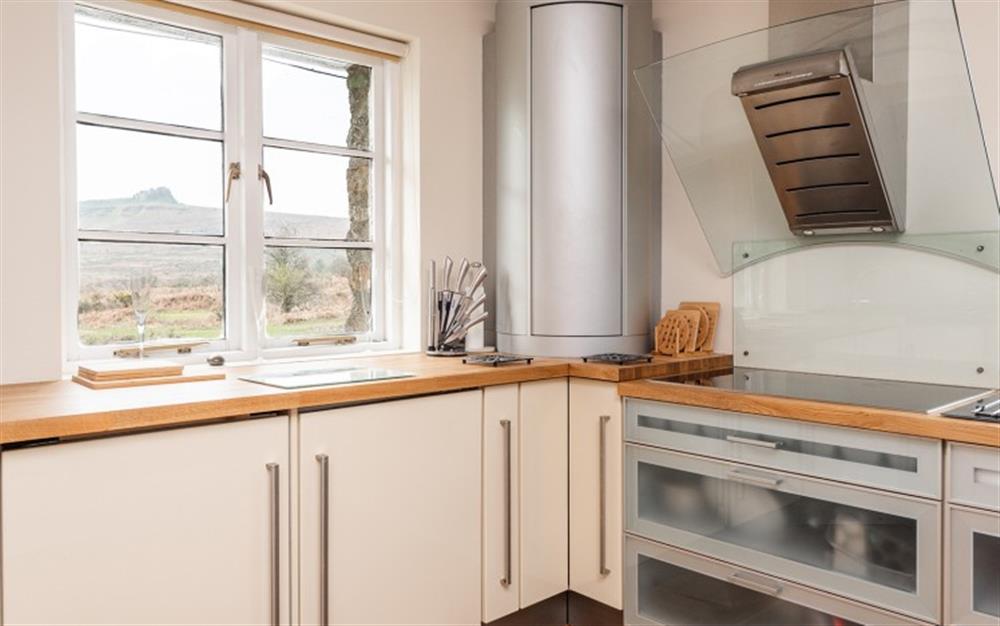 Fitted kitchen with views to Haytor rocks. at Rayland House in Haytor