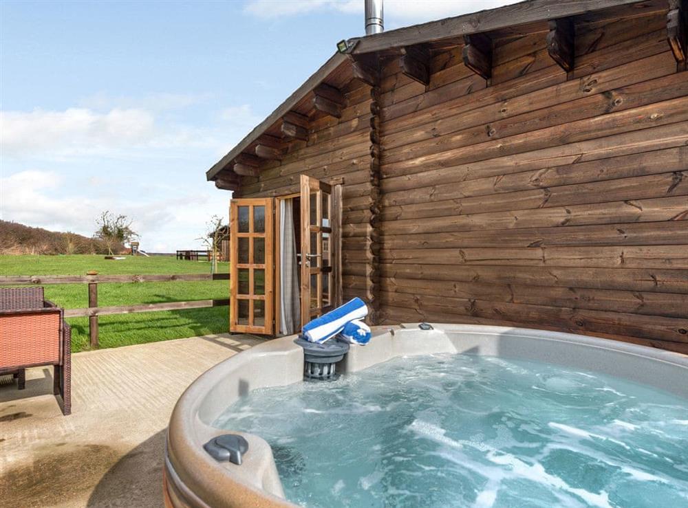 Relaxing hot tub with wonderful rural view at Dukes Wood, 
