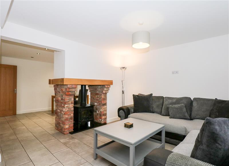 Relax in the living area at Red Brick Cottage, Greenfield near Alford