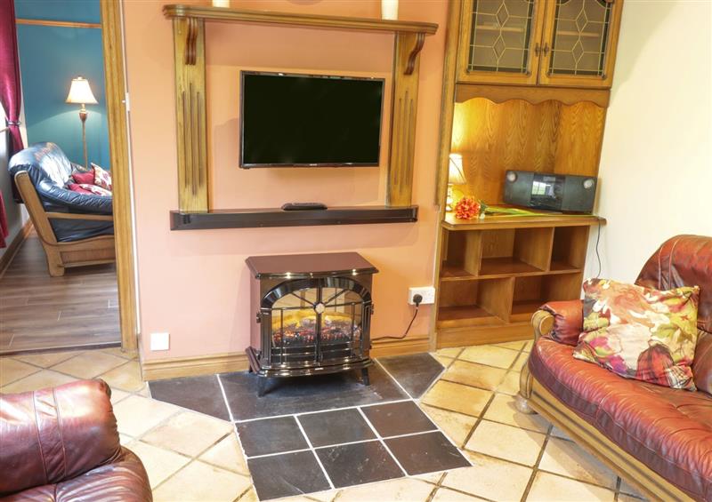 Relax in the living area at Red Cottage, Collooney