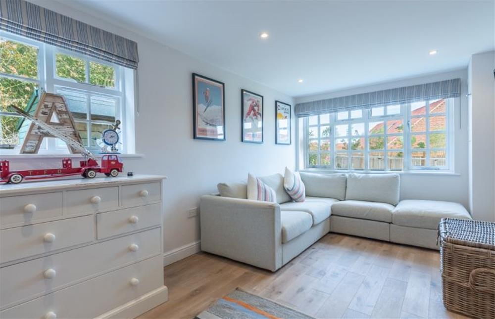Ground floor: Family room has comfy corner sofa, games and Smart Television at Red Gables, Burnham Market near Kings Lynn