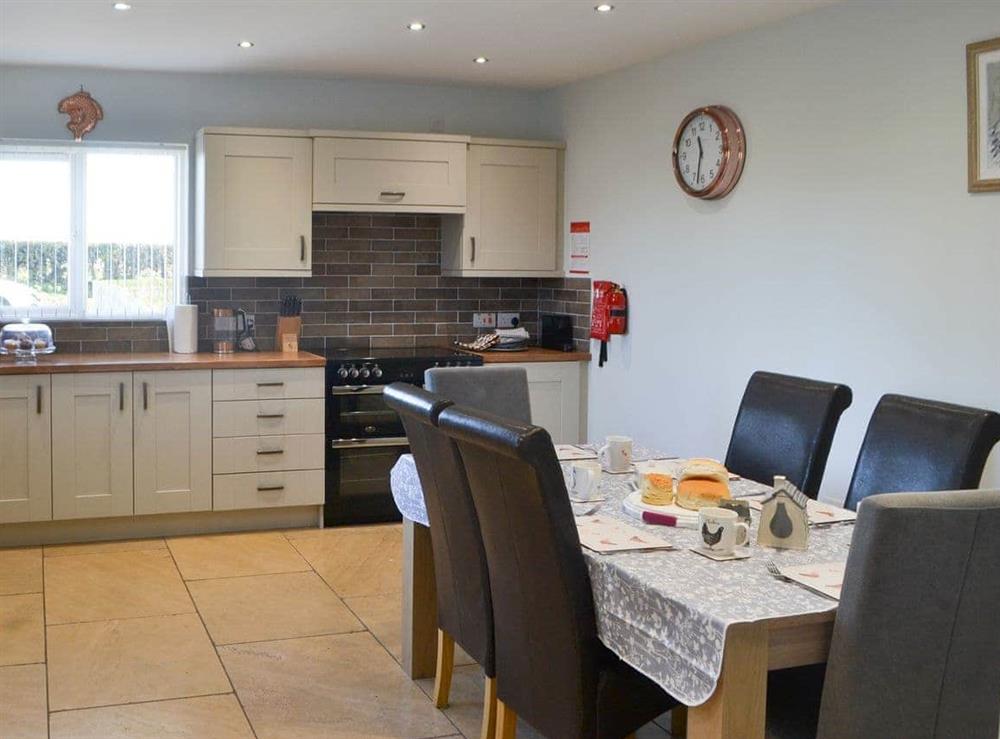 Lovely spacious kitchen with dining area at Red Hen Cottage in Acklington, Northumberland