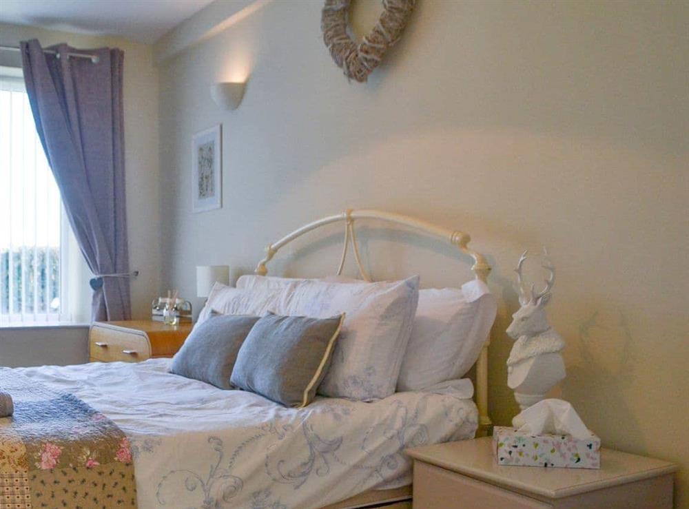 Relaxing and inviting bedroom at Red Hen Cottage in Acklington, Northumberland