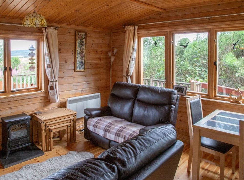 Open plan living space at Red Kite Cottage in Redfield, near Inverness, Loch Ness and Nairn, Inverness-Shire