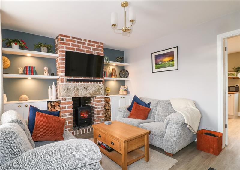 Relax in the living area at Red Robin Cottage, Tupton
