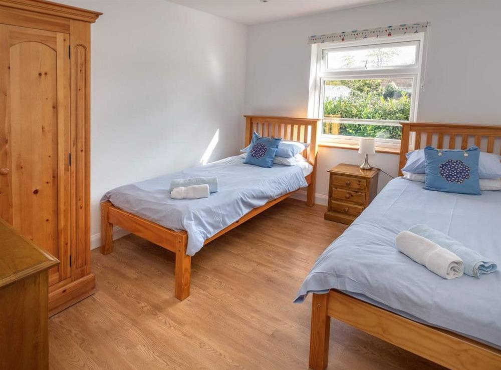 Comfortable twin bedroom at Red Squirrel Lodge in Wootton, near Newport, Isle of Wight