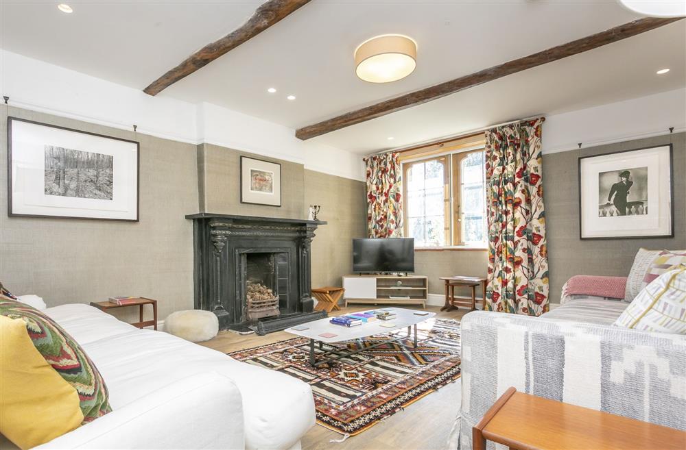 Sitting room with exposed beams