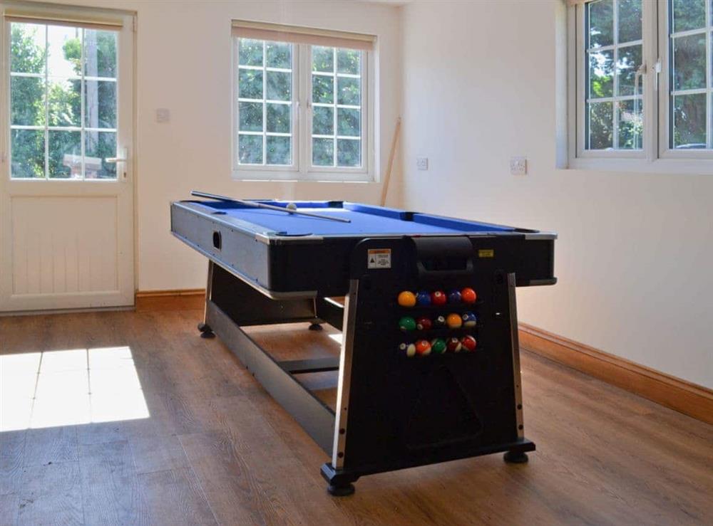 Enjoy a game or two of pool, the table also converts to a table tennis table