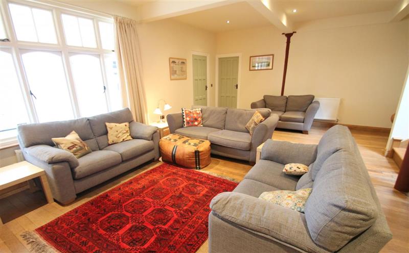 Relax in the living area at Redway Lodge, Porlock
