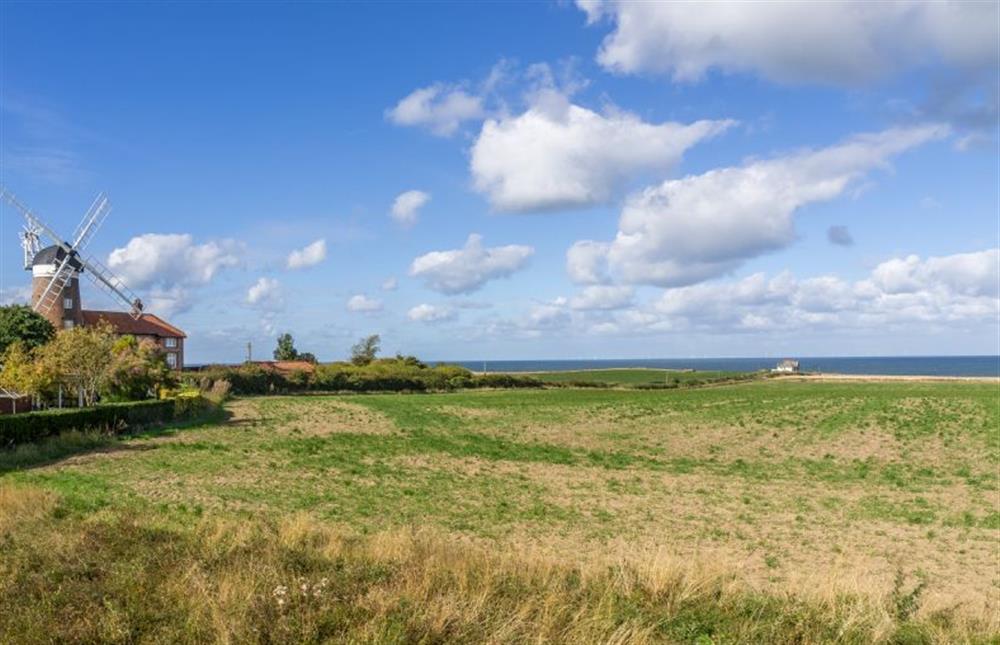 A view to the coast at Weybourne with windmill at Reedcutter Lodge, Weybourne near Holt