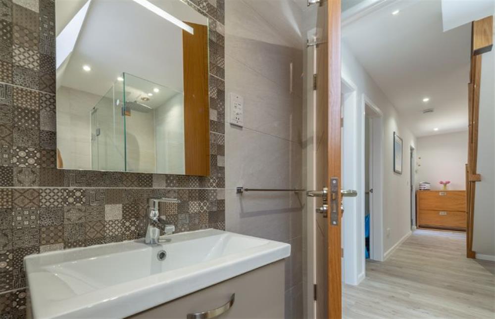 First floor: Bathroom at Reedcutter Lodge, Weybourne near Holt