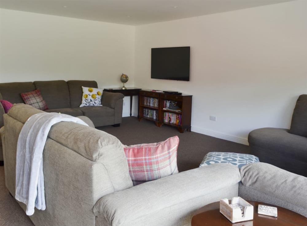 Spacious and comfy livign area at Reeds Farmhouse in Farnham, Hampshire