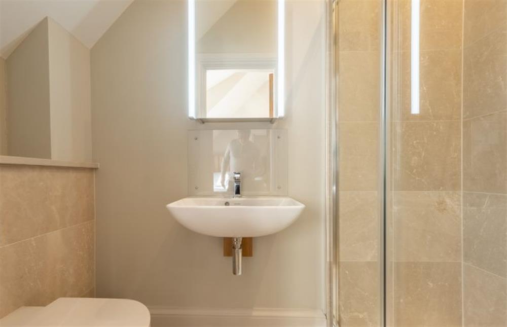 First floor:  En-suite shower room with wash basin and WC at Reenroe, Docking near Kings Lynn