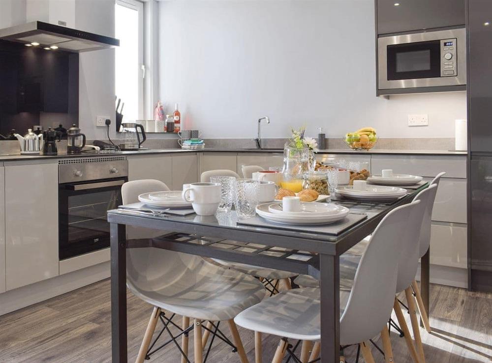 Fully equipped kitchen with dining area at Reflections in St Monans, near Anstruther, Fife
