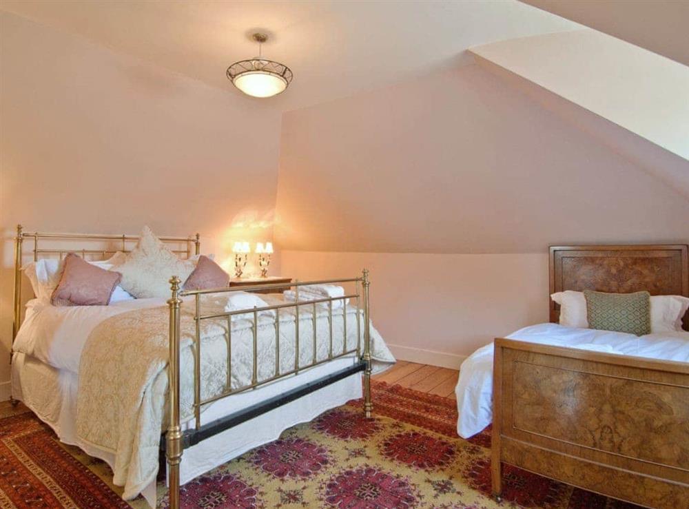 Cosy bedroom with double bed and additional single at Regents House in Arundel, West Sussex., Great Britain