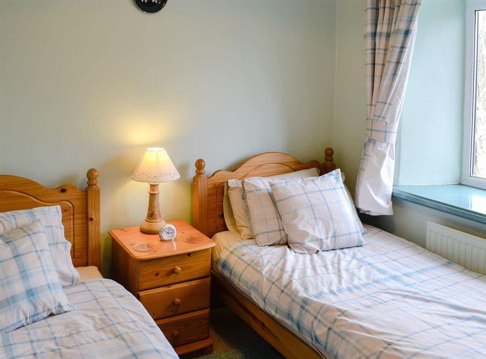 Twin bedroom at Regina Cottage in Mangerton, Nr Bridport, Dorset., Great Britain