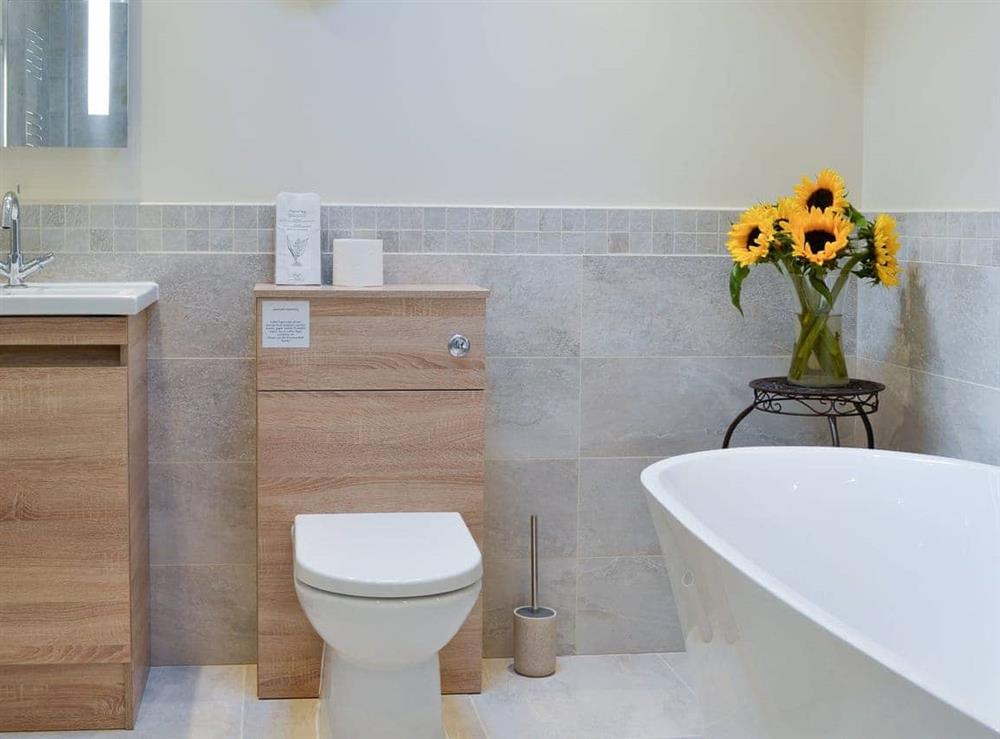 Half-tiled bathroom at Reivers Retreat in Denton Mill, near Brampton, Cumbria