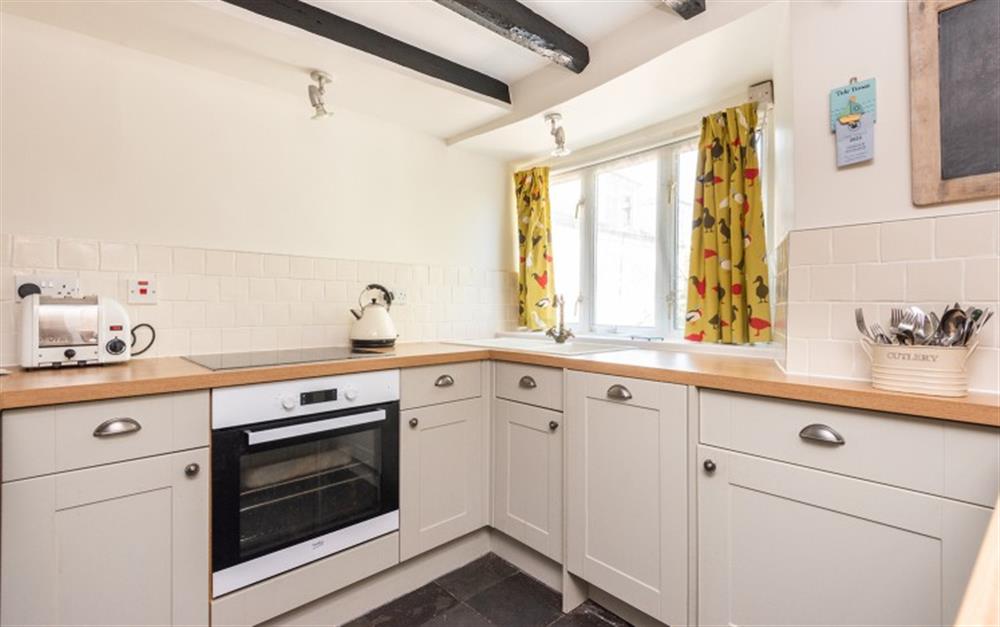 Modern fitted kitchen with plenty of worktop space at Rest Cottage in Stokenham