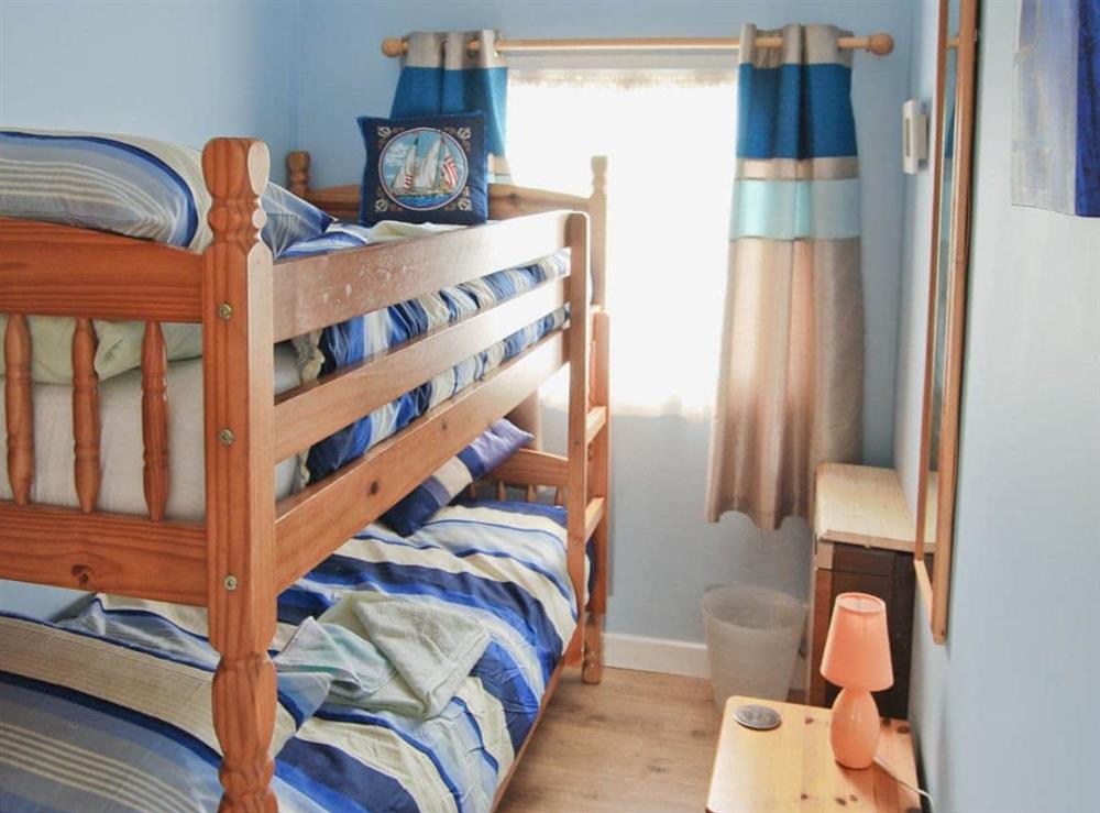 Bunk bedroom at Rest-Haven in Bacton, near Wroxham, Norfolk