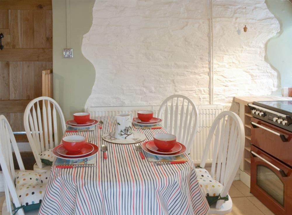 Convenient dining area within kitchen at Revels Retreat in Brixham, Devon