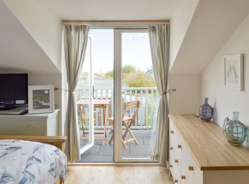 French door to balcony in main double bedroom at Revels Retreat in Brixham, Devon