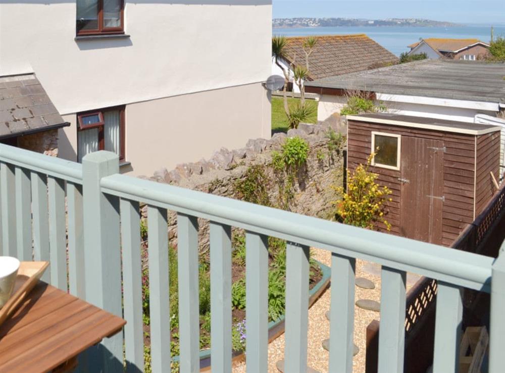 View from balcony over the enclosed courtyard at Revels Retreat in Brixham, Devon